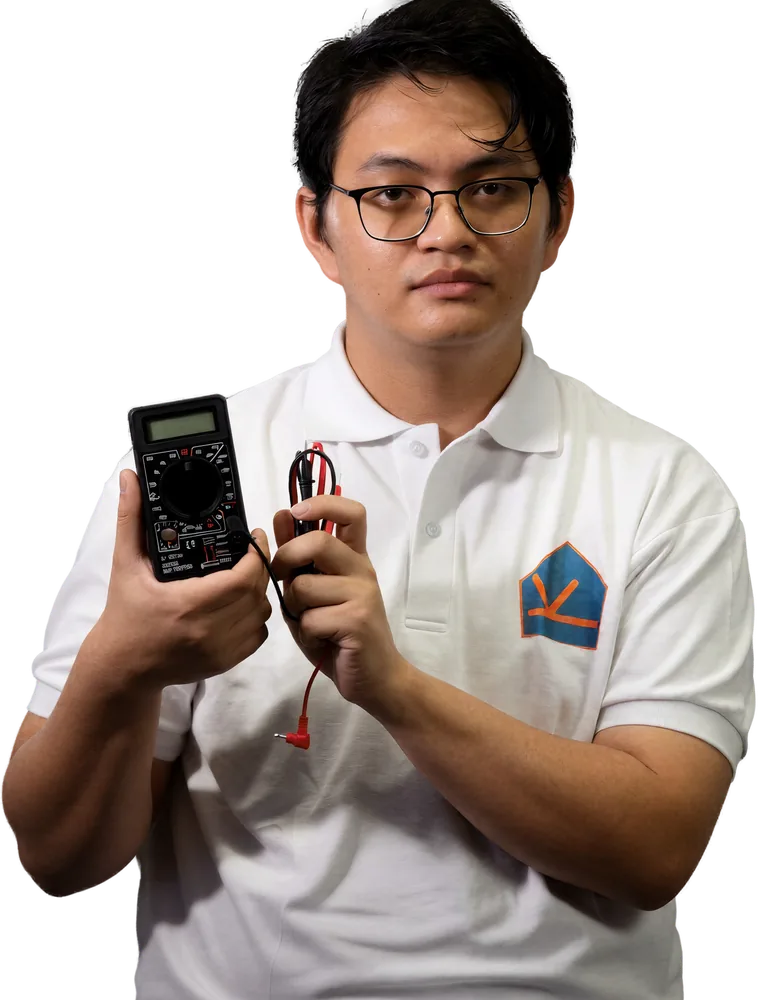 A KuyaYos electrician holding a multimeter
